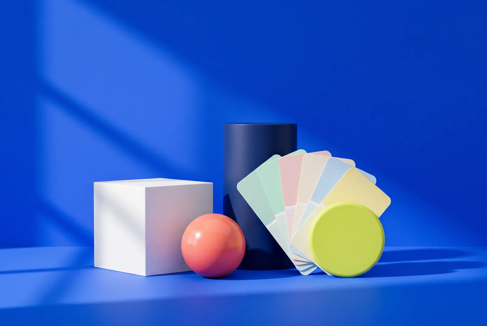 Colored shapes and blank paint swatches on cobalt blue, with a lime disc, illustrating whether a QR code can be any shape or colour.