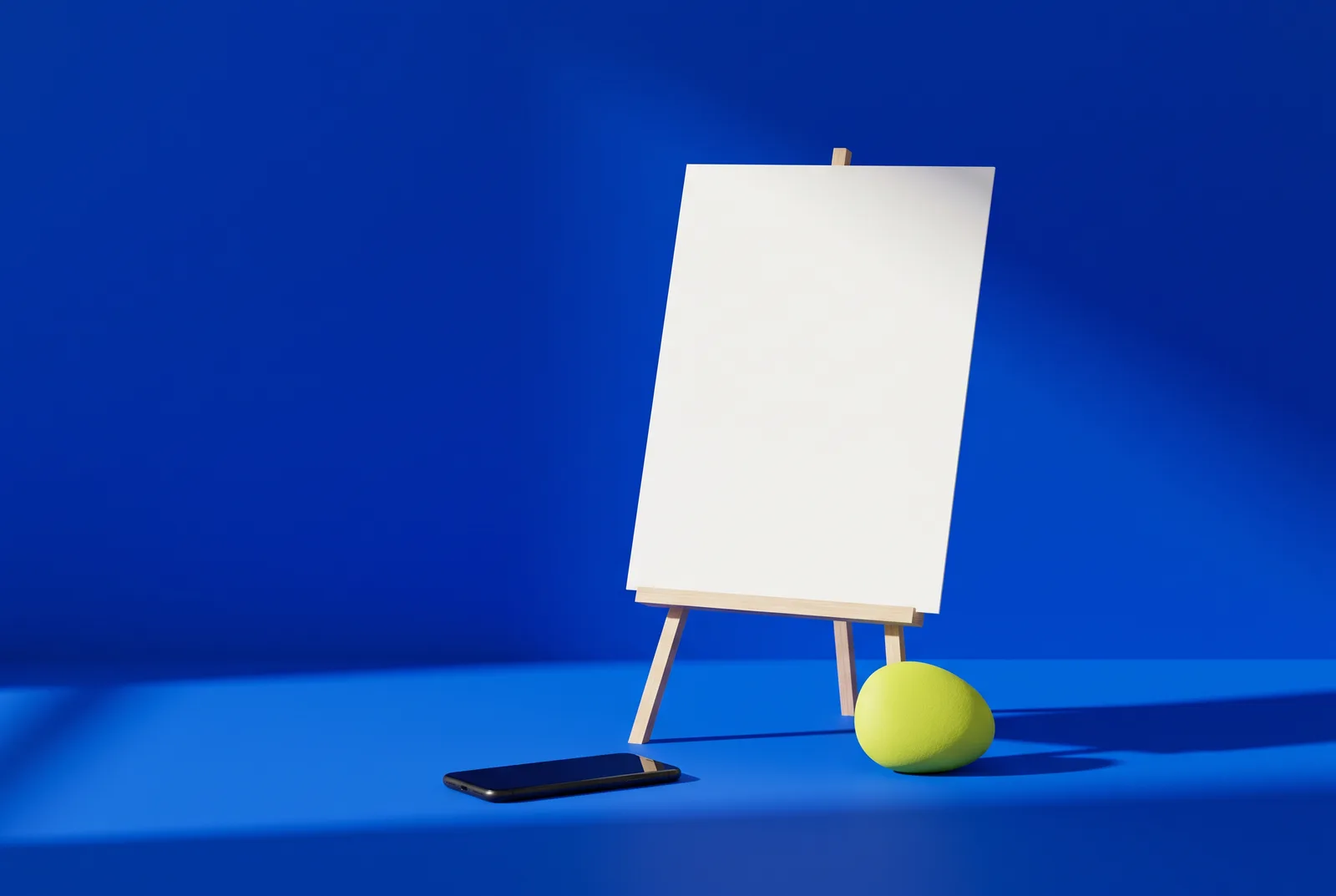 A blank poster on an easel with a phone lying face down in front of it on cobalt blue, a picture of a QR code not getting scans.