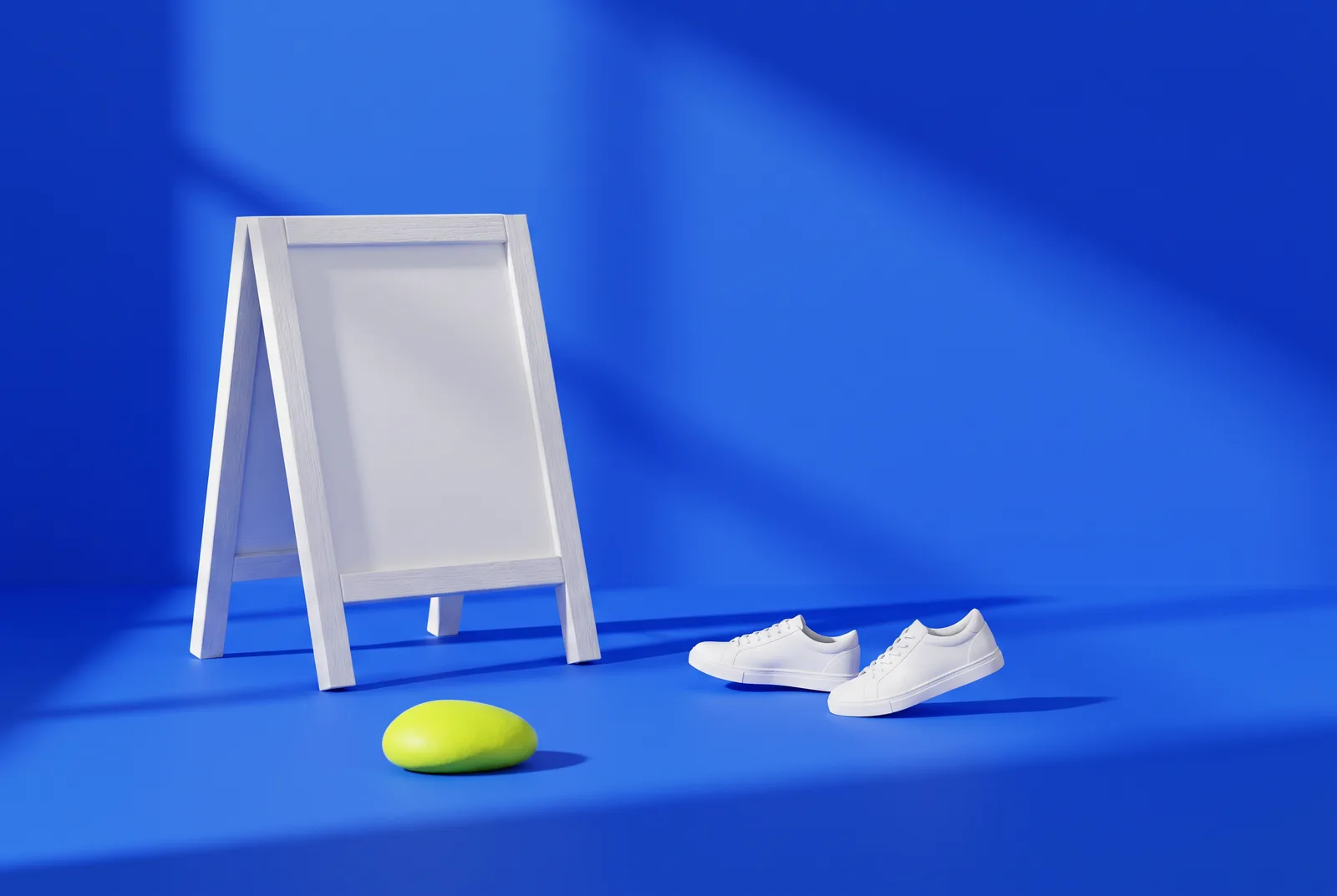A miniature white A-frame sidewalk sign with small sneakers walking toward it on a cobalt blue backdrop, the simple setup used to turn walk-bys into customers.