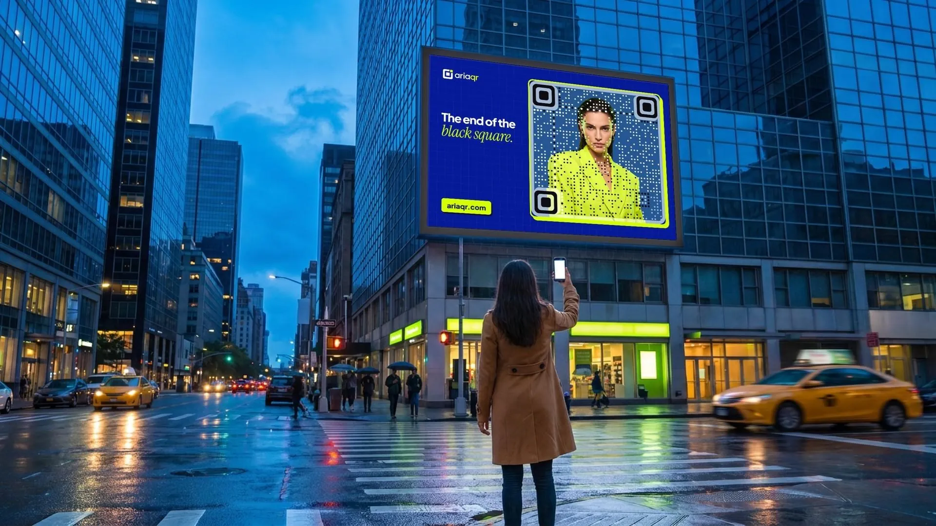 A woman on a rainy city crosswalk holds her phone up toward a billboard whose QR code is a fashion portrait in a lime jacket.